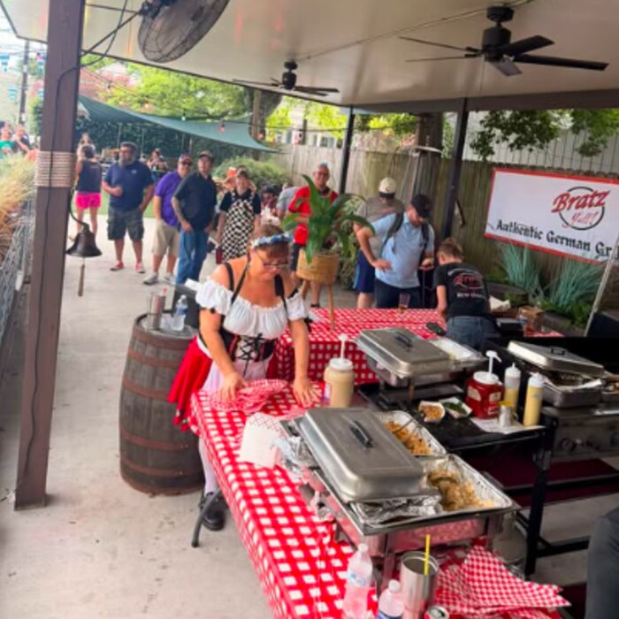 Crowd lined up at the Bratz Y'all pop-up at Port Orleans Brewing Co.